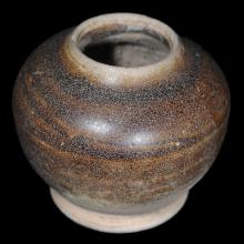 Small maroon enameled-sandstone vessel